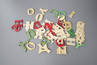 Boxed stained ivory letters, 19th century